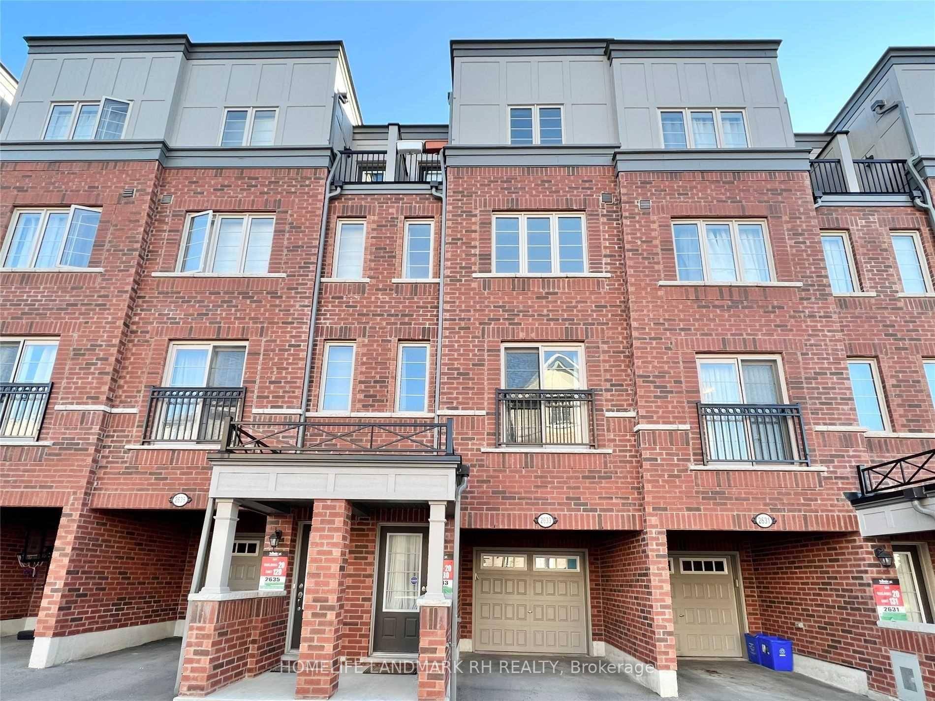 4 Bedroom All Brick Townhome With Backyard amp ; Built In Garage.