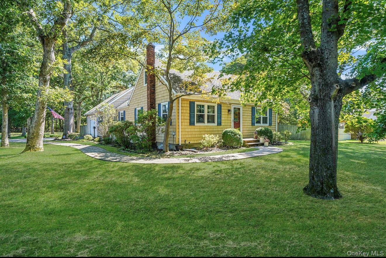 Welcome Home to this Charming 3 4 Bed 2 Bath expanded cape set on a beautiful large park like corner property.