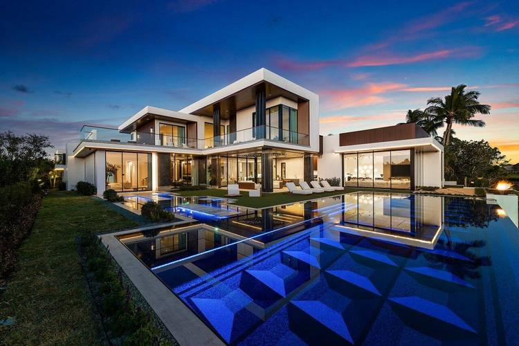 Step into unparalleled luxury in this brand new custom estate located in the prestigious guard gated community of Admirals Cove.