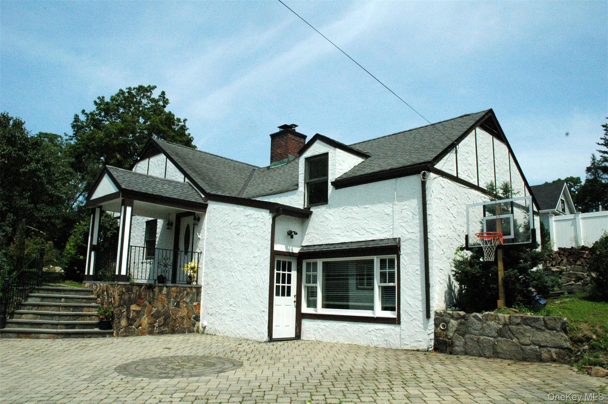 Experience a totally updated rare gem in the heart of Armonk a beautifully maintained 1, 500 square foot private cottage that blends charm, comfort, and convenience.