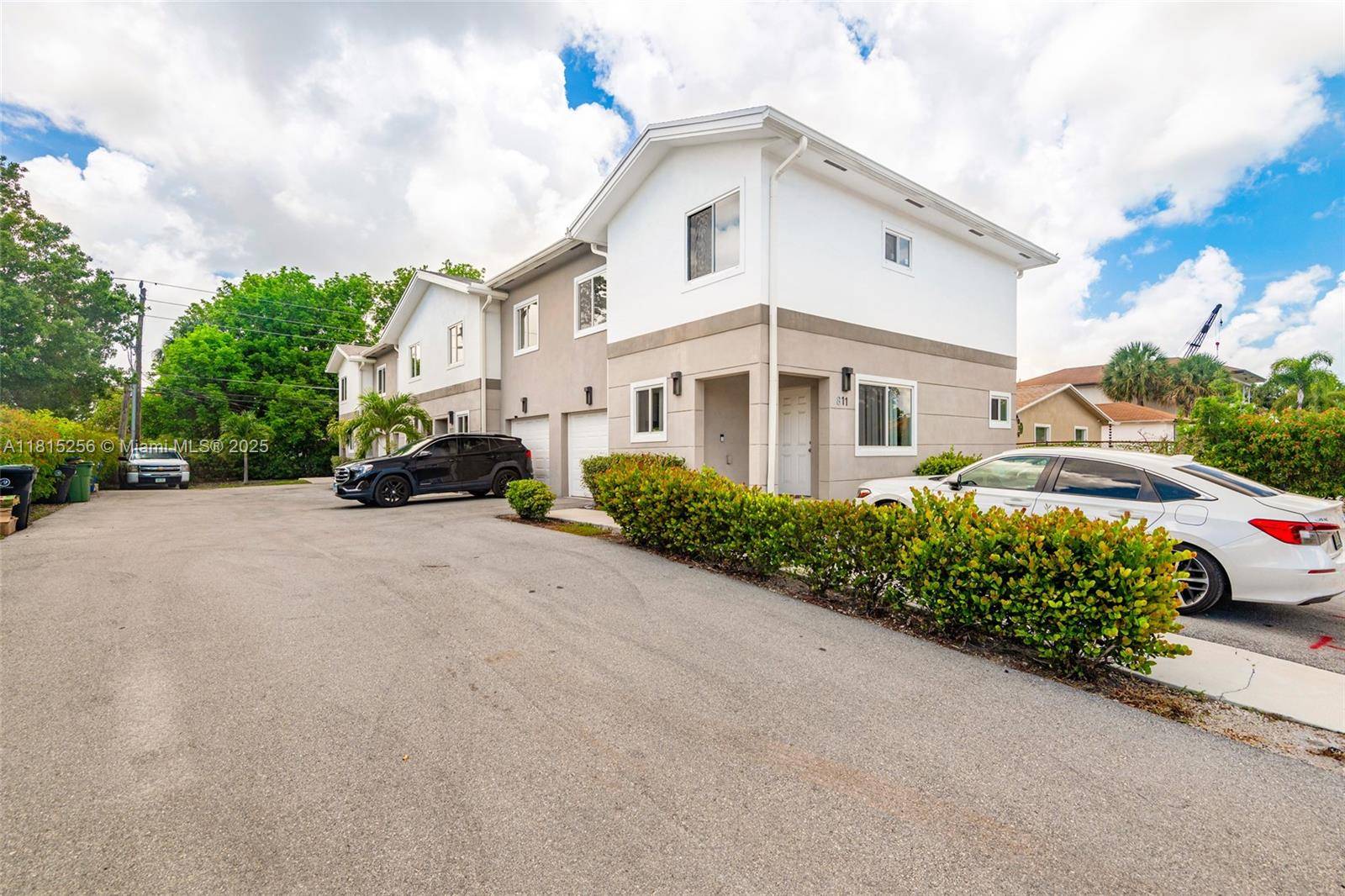 Located at 811 NW 3rd Ave, this inviting property offers a perfect combination of modern style and classic charm.