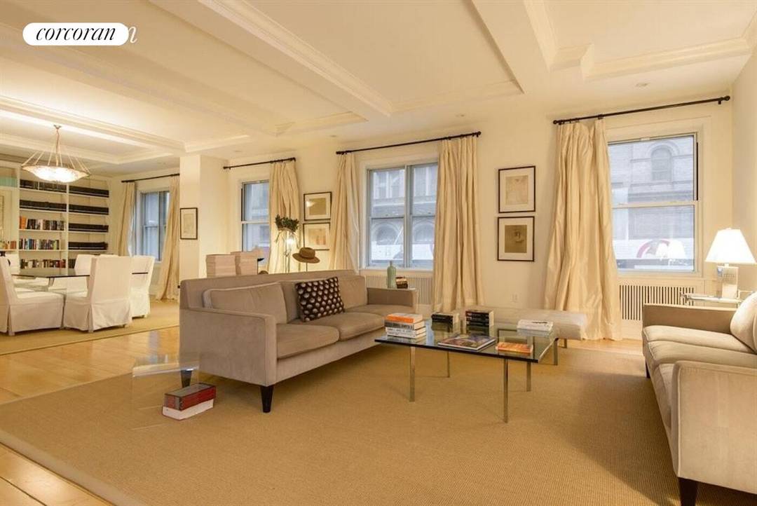 Situated on Billionaire's Row, this elegantly renovated 3 BR 3 bath Midtown West condo offers 10' ceilings, over 2700 SF of living space, amp ; generous room sizes.