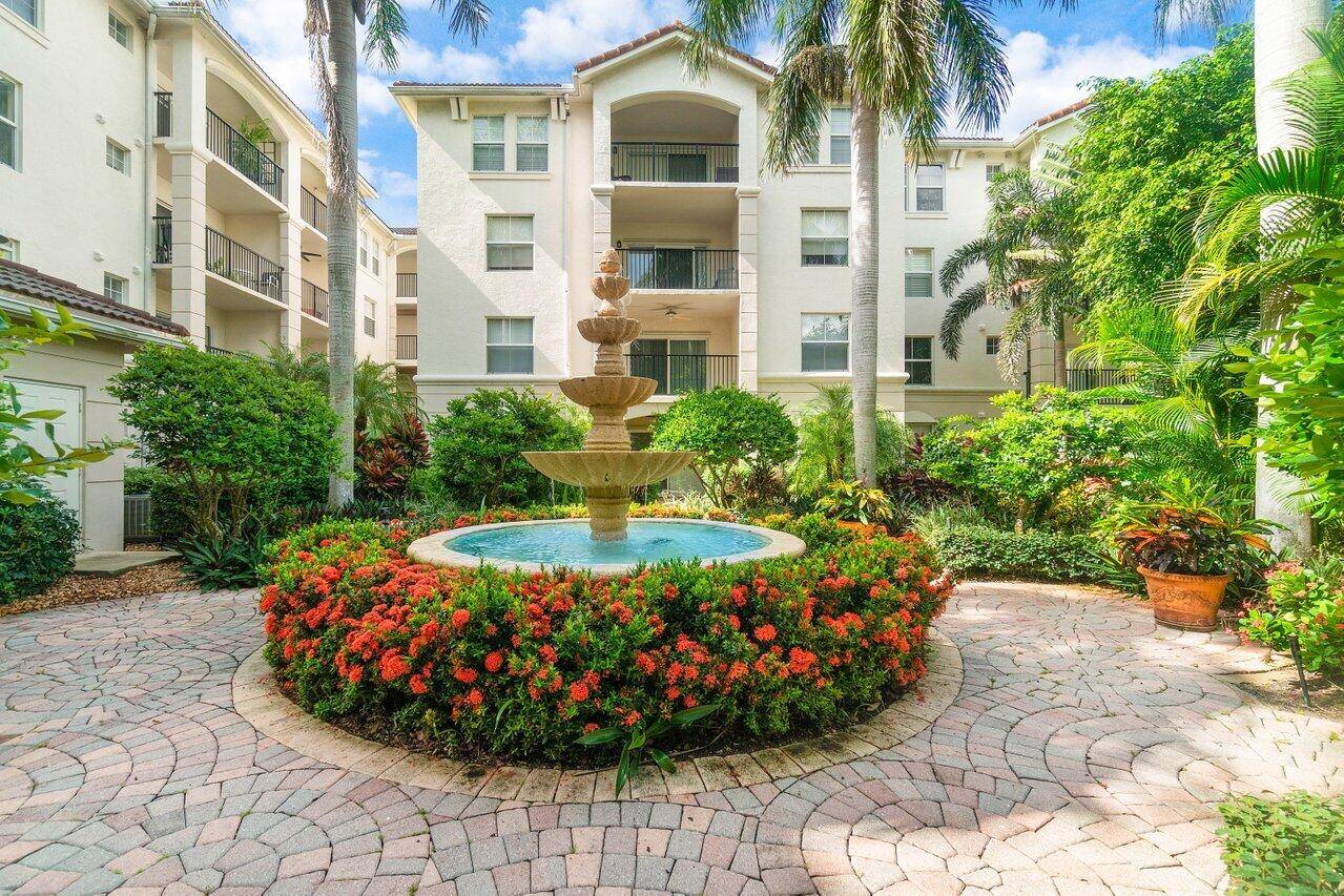Enjoy serene private garden views from your tiled balcony in this light filled condo.