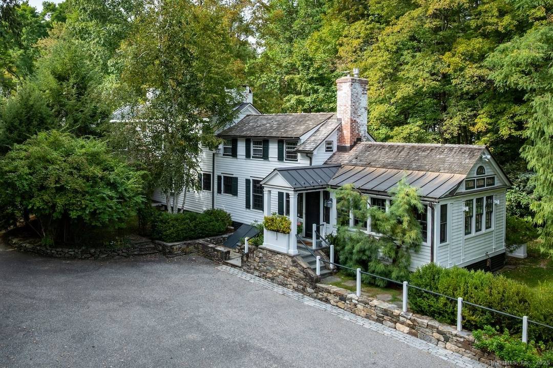 This 1807 New England home stands prominently in Salisbury's Historic District, gracing 1.