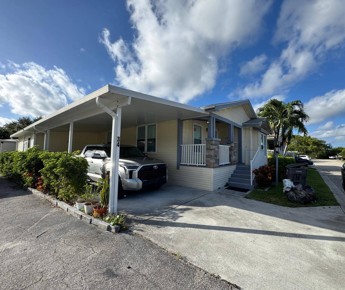 Welcome to this beautifully maintained 5 bedroom, 4 bath mobile home located in the desirable Palm Beach Colony Community, an ALL AGE neighborhood offering comfort, convenience, and safety for the ...