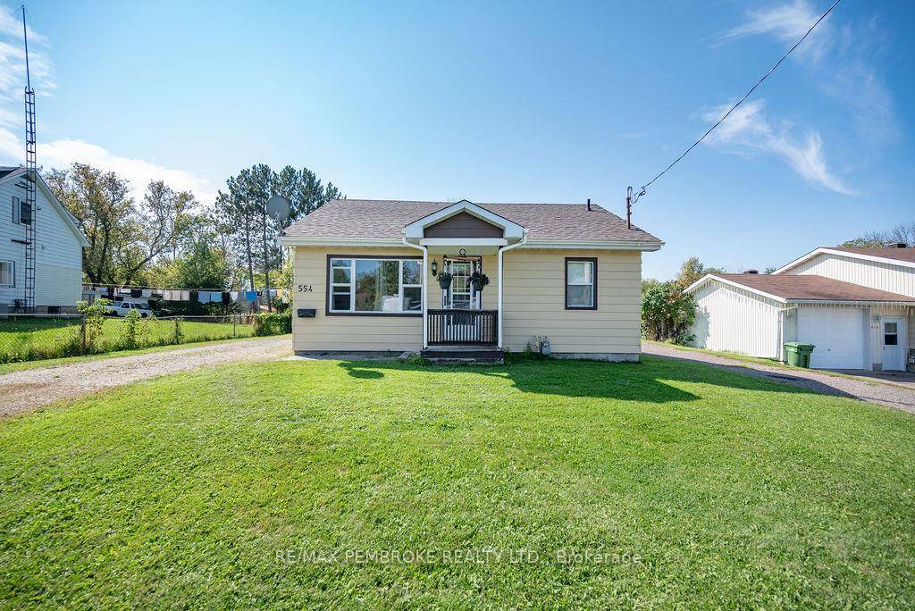 This newly renovated, affordable home has an attached apartment or in law suite.