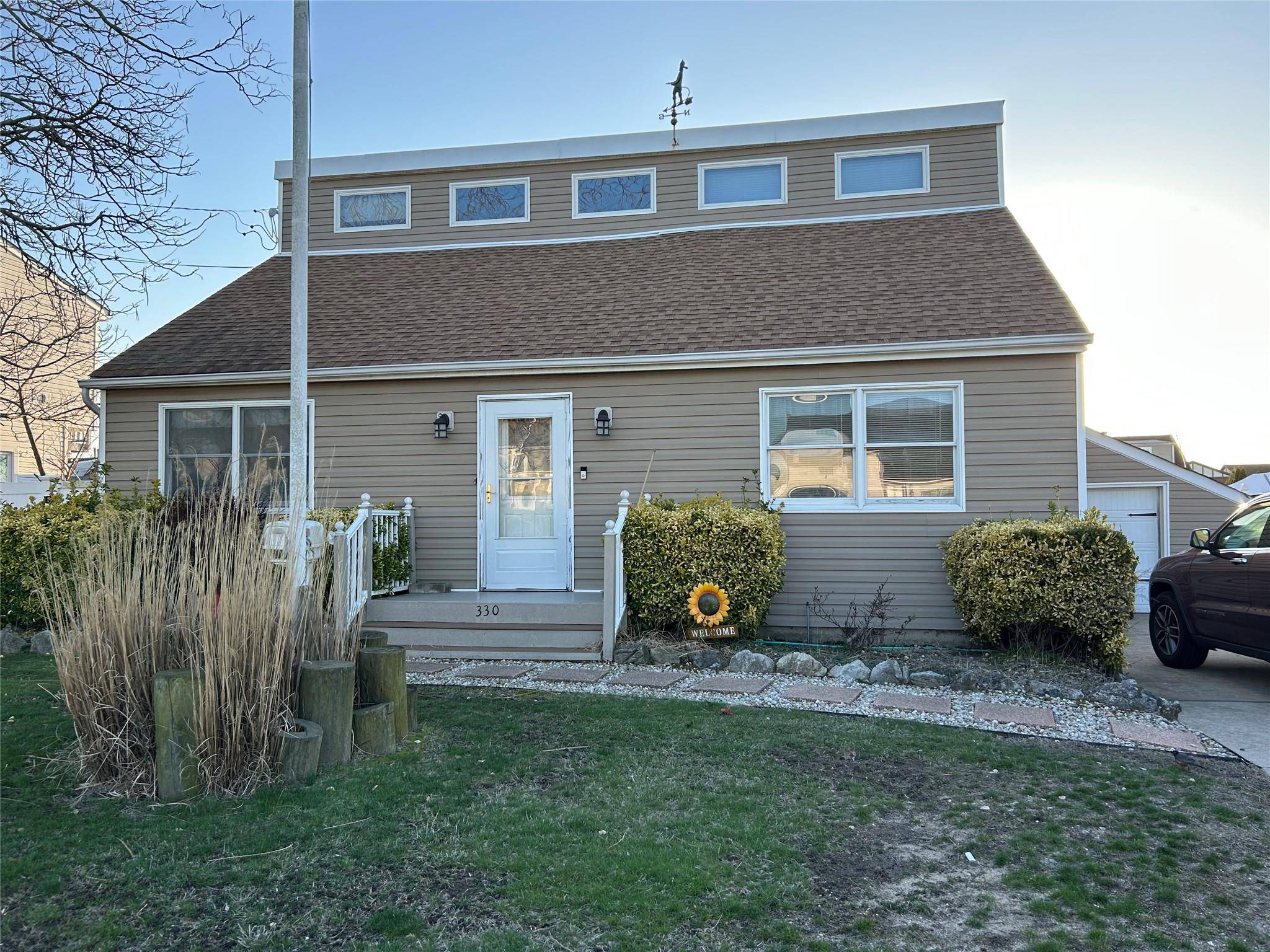 BOATERS PARADISE ! COME MAKE THIS HOME ON A CANAL YOUR OWN IN TIME FOR THE SUMMER !