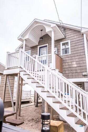 Three direct beachfront cottages located right on the sand of the Long Island Sound in Clinton, Connecticut offer a rare turnkey coastal investment opportunity.