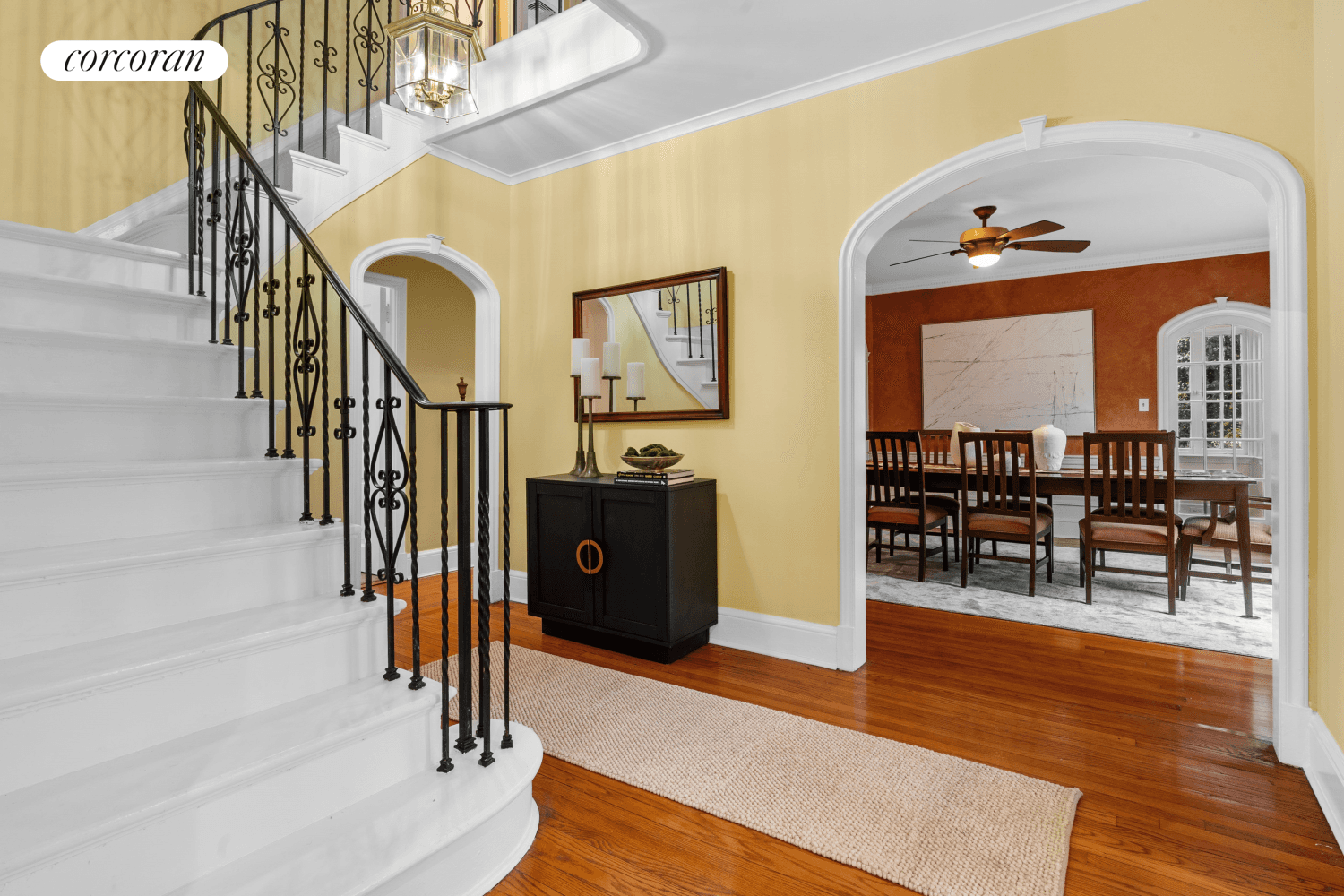 Imagine residing in a distinguished, freestanding Federalist brick home, a true landmark majestically set atop a hill on a tranquil side street within the coveted Forest Hills Gardens.