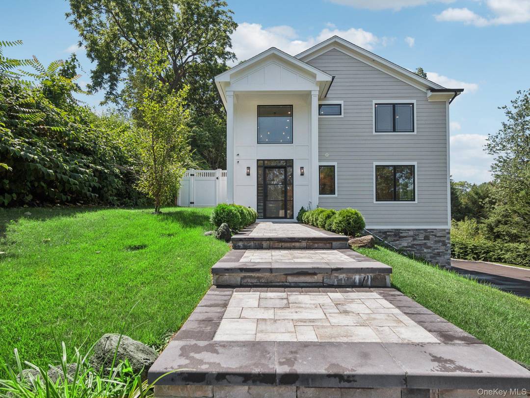 Exceptional new construction colonial nestled in the prestigious hamlet of Woodbury, NY.