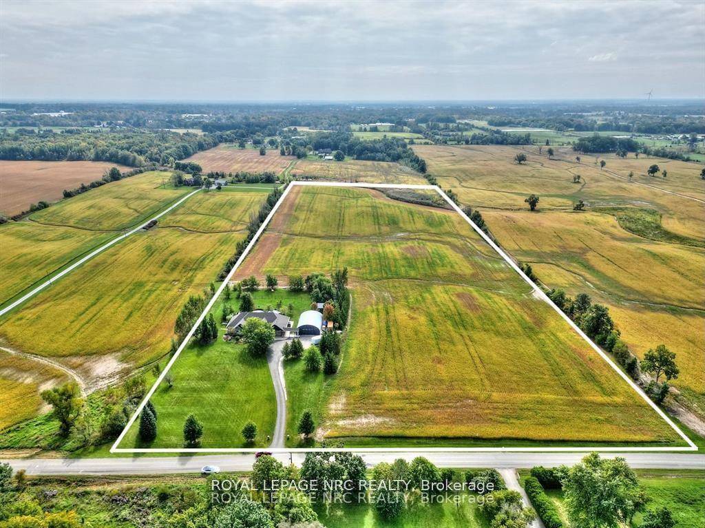 Welcome to this exceptional executive home, where luxury living meets serene countryside charm on a breathtaking 23 acre property in the peaceful Pelham countryside.
