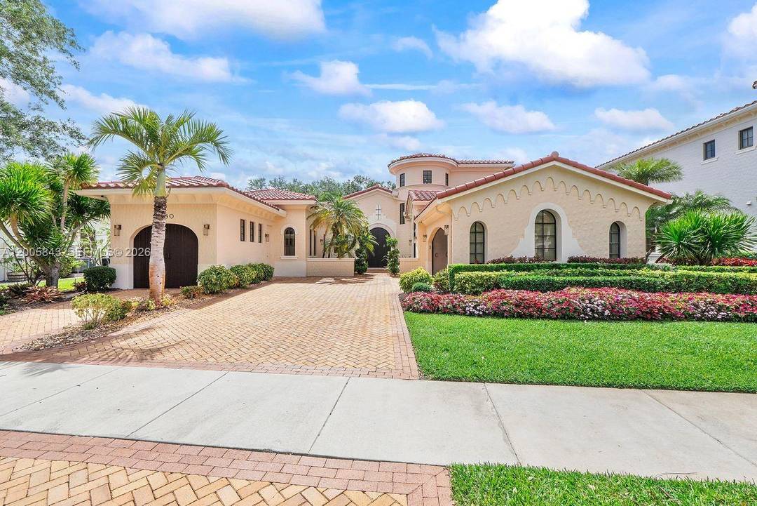 Experience refined living in prestigious Parkland Golf amp ; Country Club.
