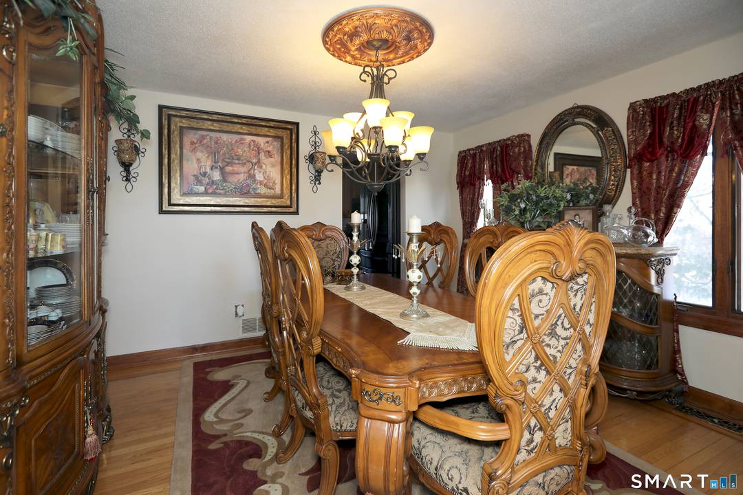 This charming home, nestled at the end of a cul de sac in Manchester, boasts a spacious two car garage, a large open foyer leading to the dining room, a ...