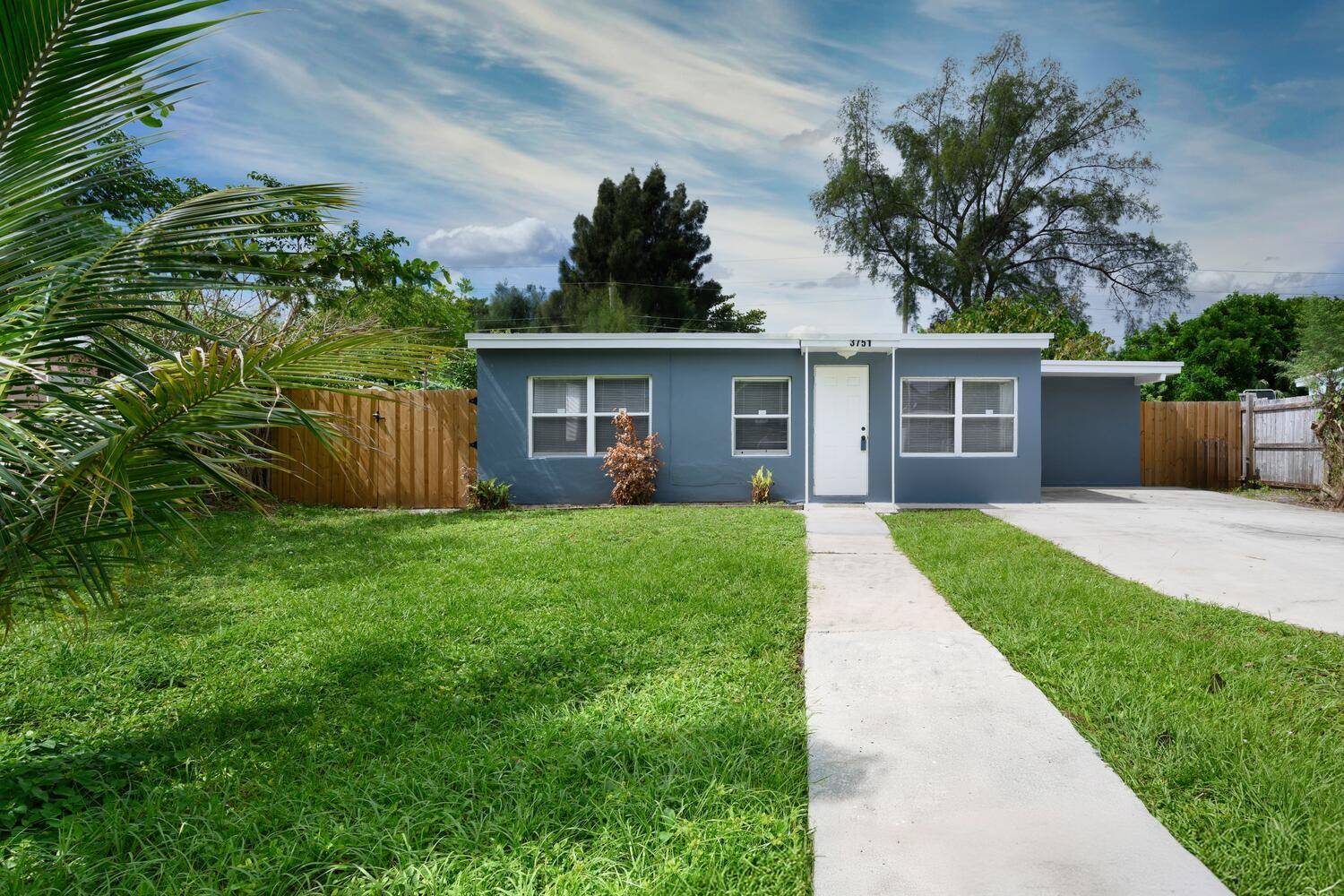 Step into timeless style with this beautifully updated CBS mid century modern gem, ideally situated in the sought after San Castle subdivision just minutes from shopping, dining, and the beach.