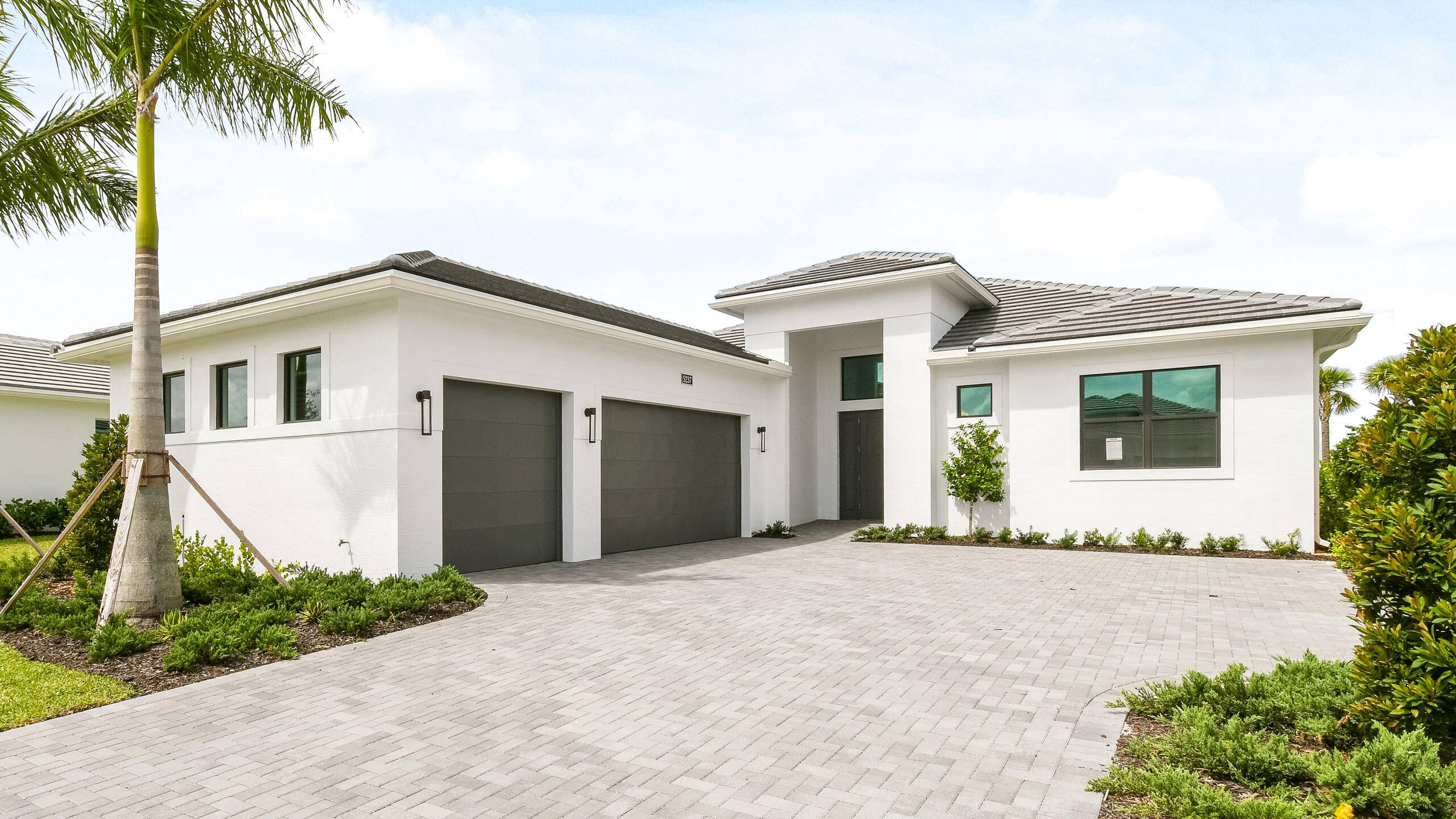 New Construction Move In Ready This brand new Riley floorplan is situated on a private homesite in a gated 55 community.