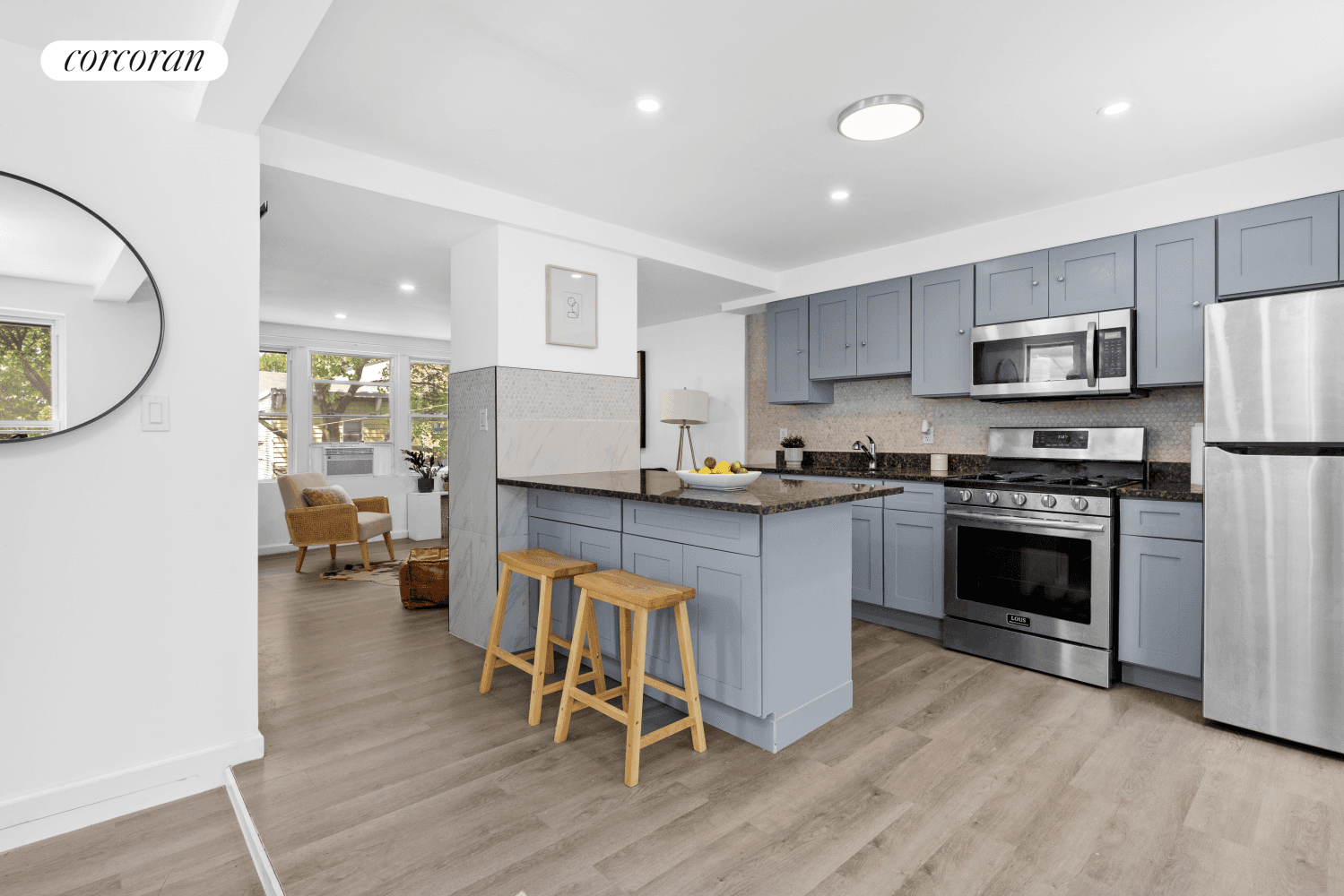 Welcome home to 21 E 4th Street a three story two family Townhouse, thoughtfully designed for flexible living, complete with an extra wide driveway and nestled on a serene tree ...