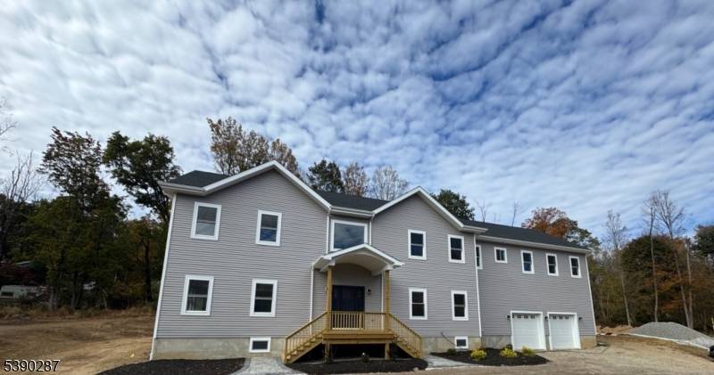 Welcome to this stately two story Colonial, a brand new construction home that perfectly blends timeless architecture with today's modern comforts.
