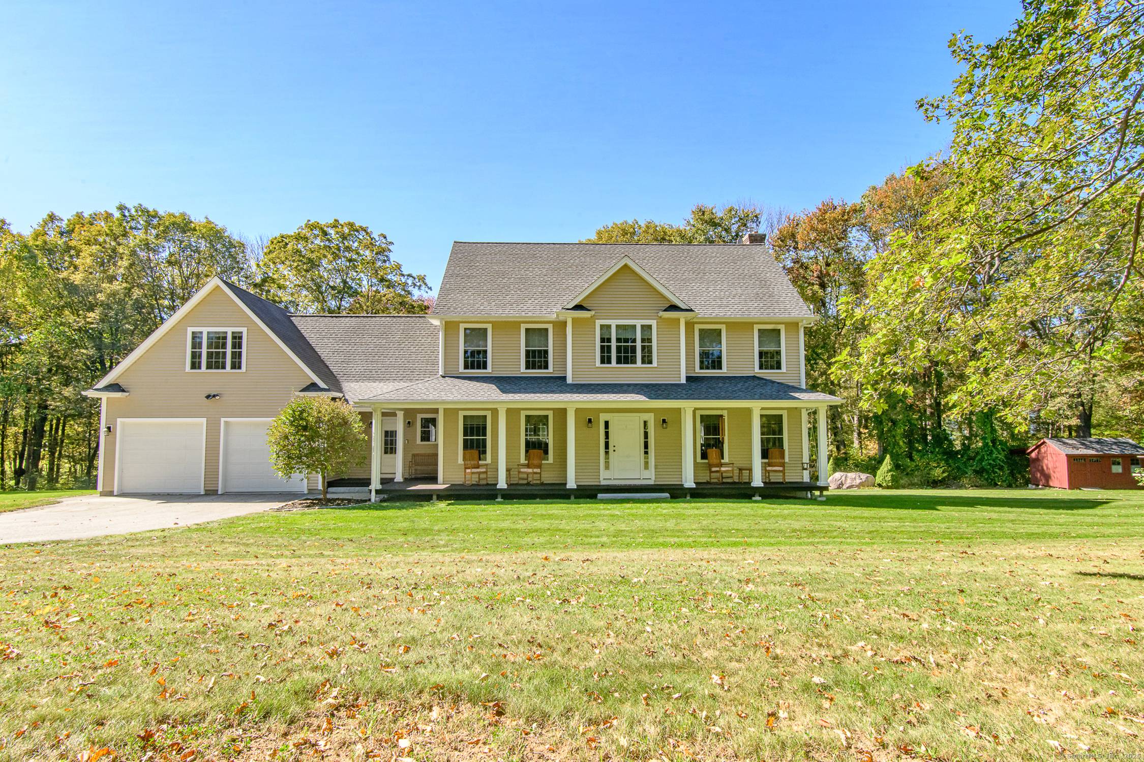 A beautifully maintained colonial nestled in one of Woodstock's most picturesque settings with many recent updates.