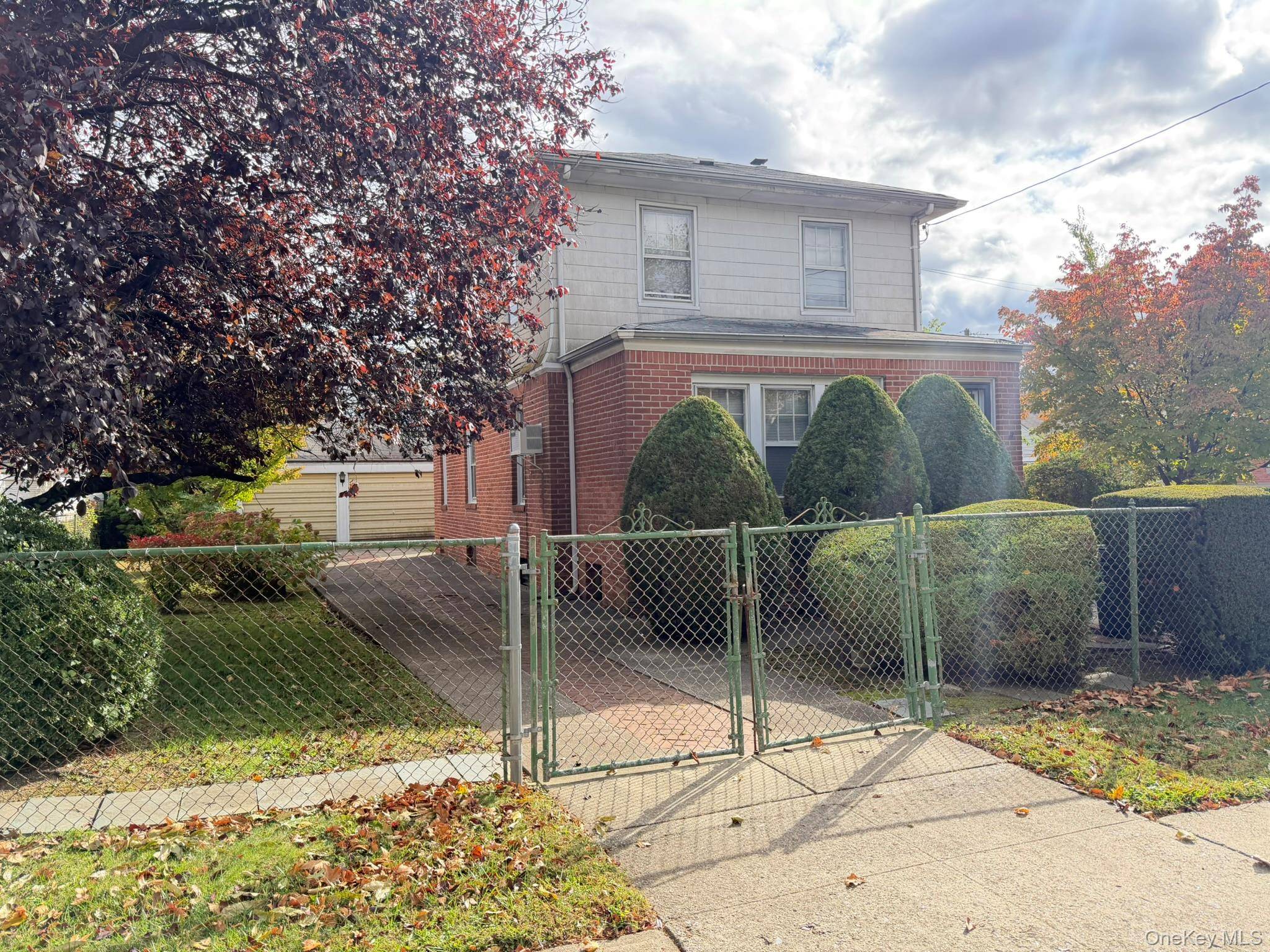 Single family home in Bayside with a HUGE lot size of 60x100, 20x24 building size, R2A zoning.