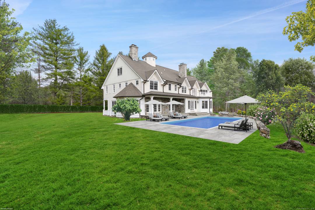 Nestled in Wilton's most prestigious enclave, the home offers nearly 3 acrs of breathtaking beauty privacy.