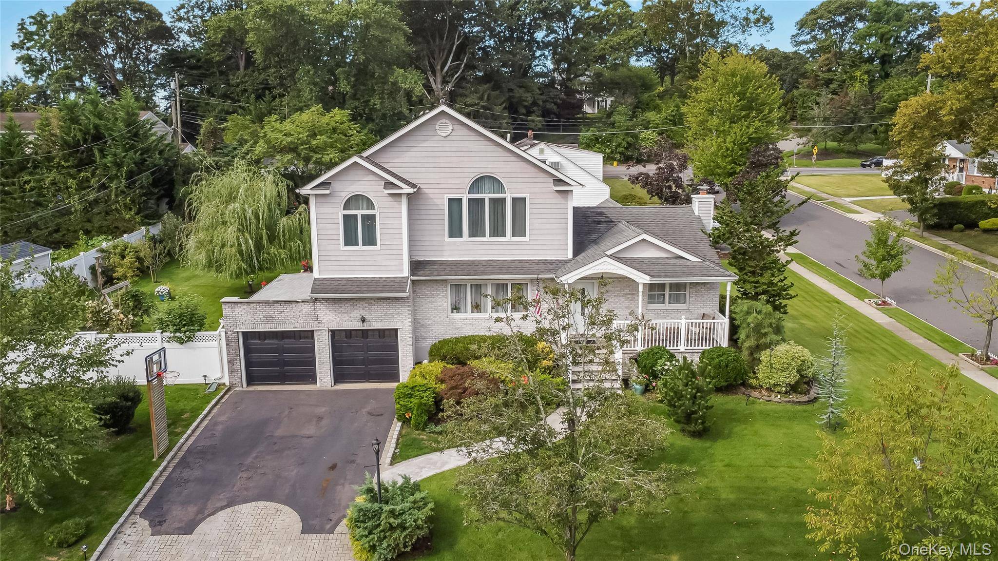 Magnificent, newly renovated one of a kind Victorian style Expanded Ranch, 3, 000 square feet of thoroughly designed living space, situated on quiet block, North Farmingdale, Inc.