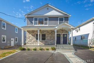 Discover your new home at 201 Nassau BIvd in Garden City South !