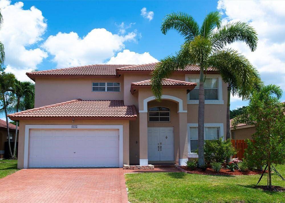 Welcome to your dream home in the prestigious gated Newport community of Turtle Run Coral Springs !
