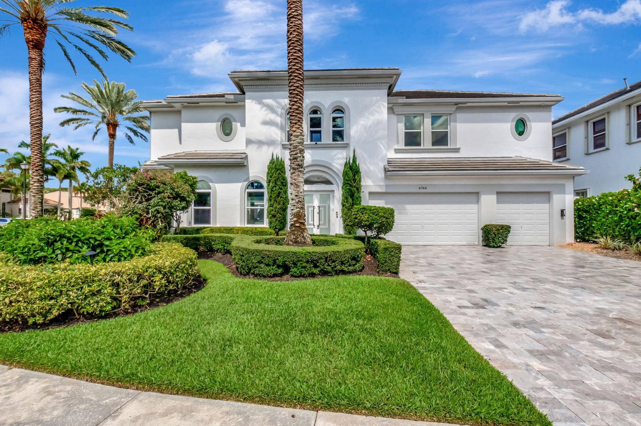 Welcome to the highly sought after luxurious boutique community of Grande Orchid next to the famous Morikami Gardens and Morikami Park Elementary.