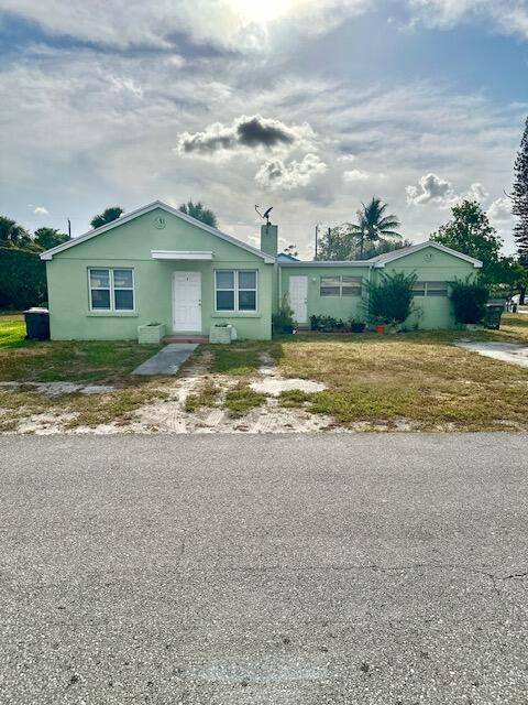INCOME PRODUCING DUPLEX IN PRIME WEST PALM BEACH LOCATION !