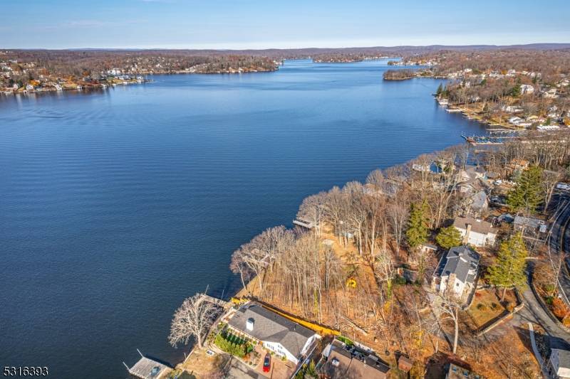Majestic lake home many updates 5 Beds, 3 Baths, Garage, Main Lake, Deep Water, Sunsets, 1.