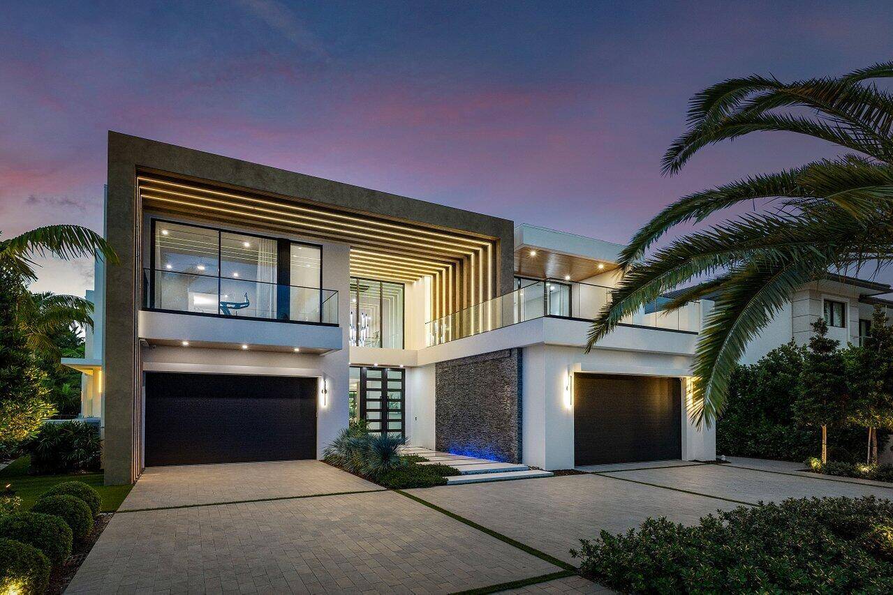 217 Thatch Palm Dr, Brand New Exquisite Contemporary Golf Course Estate sits on the 15th hole located in the world renowned Royal Palm Yacht CC.