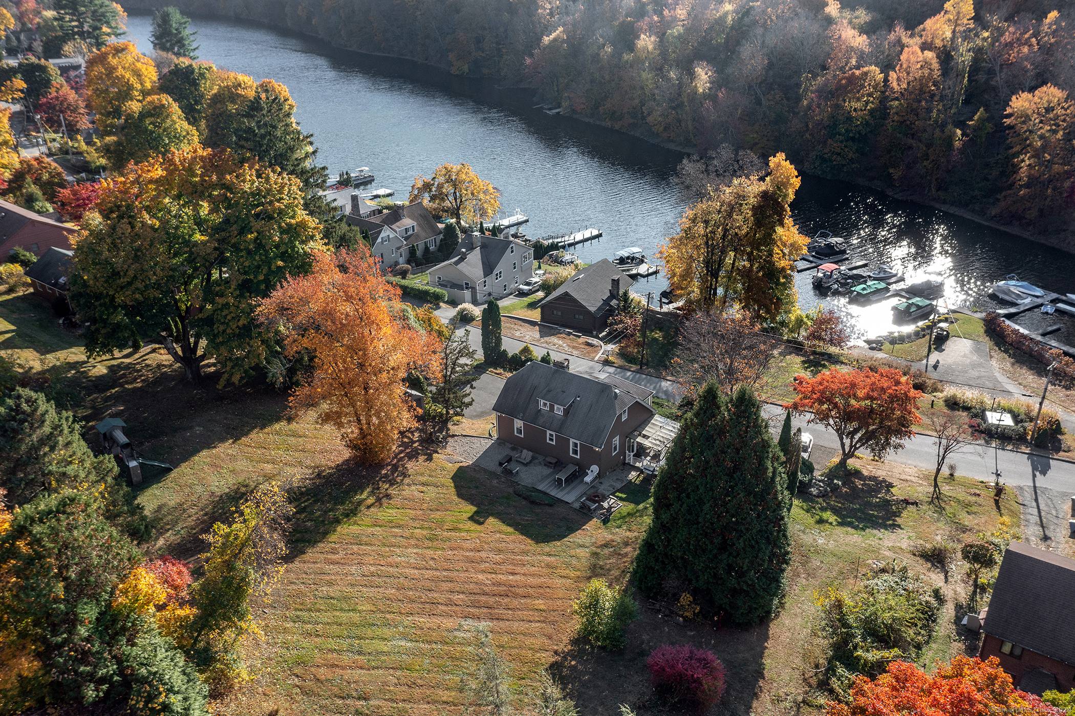 Truly New England home nestled in a desirable location in the prestigious Knollcrest lake community.