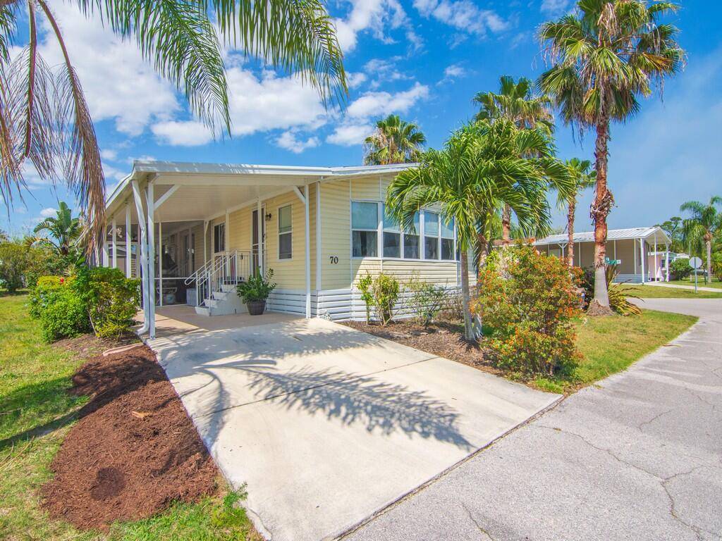 Welcome to 70 Spanish Way, a delightful 2 bedroom, 2 bathroom home nestled in the 55 community of Spanish Lakes One.