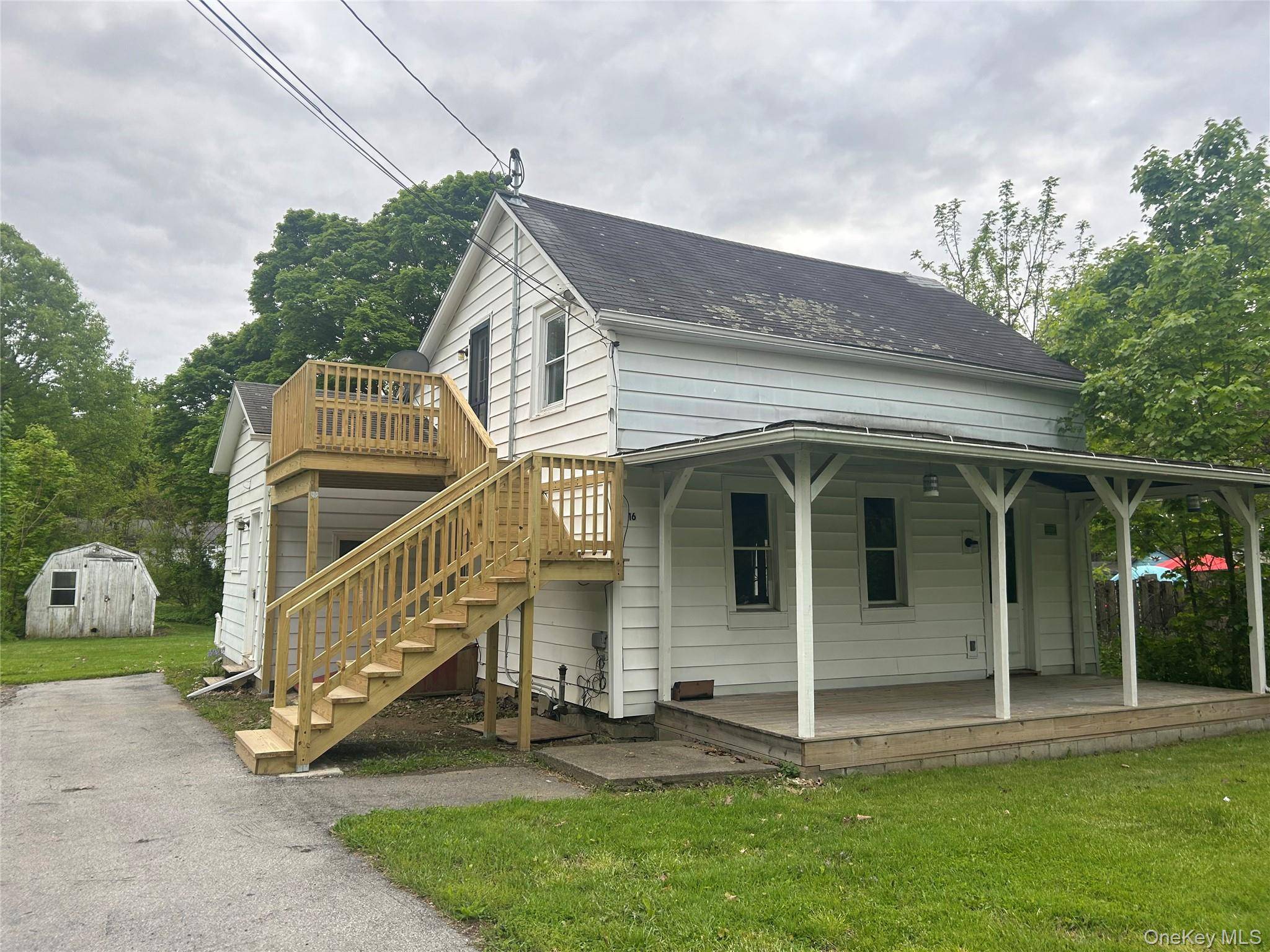 Charming 2 Unit Vintage Home in the Heart of Red Hook Village This super sweet vintage 2 unit property is ideally located on a quiet side street in the heart ...