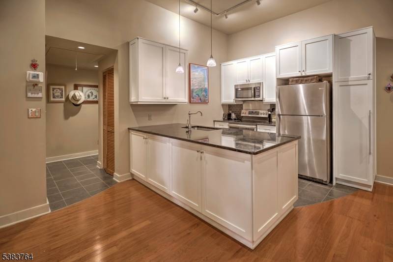 First floor living in this renovated Gladstone House Condo.
