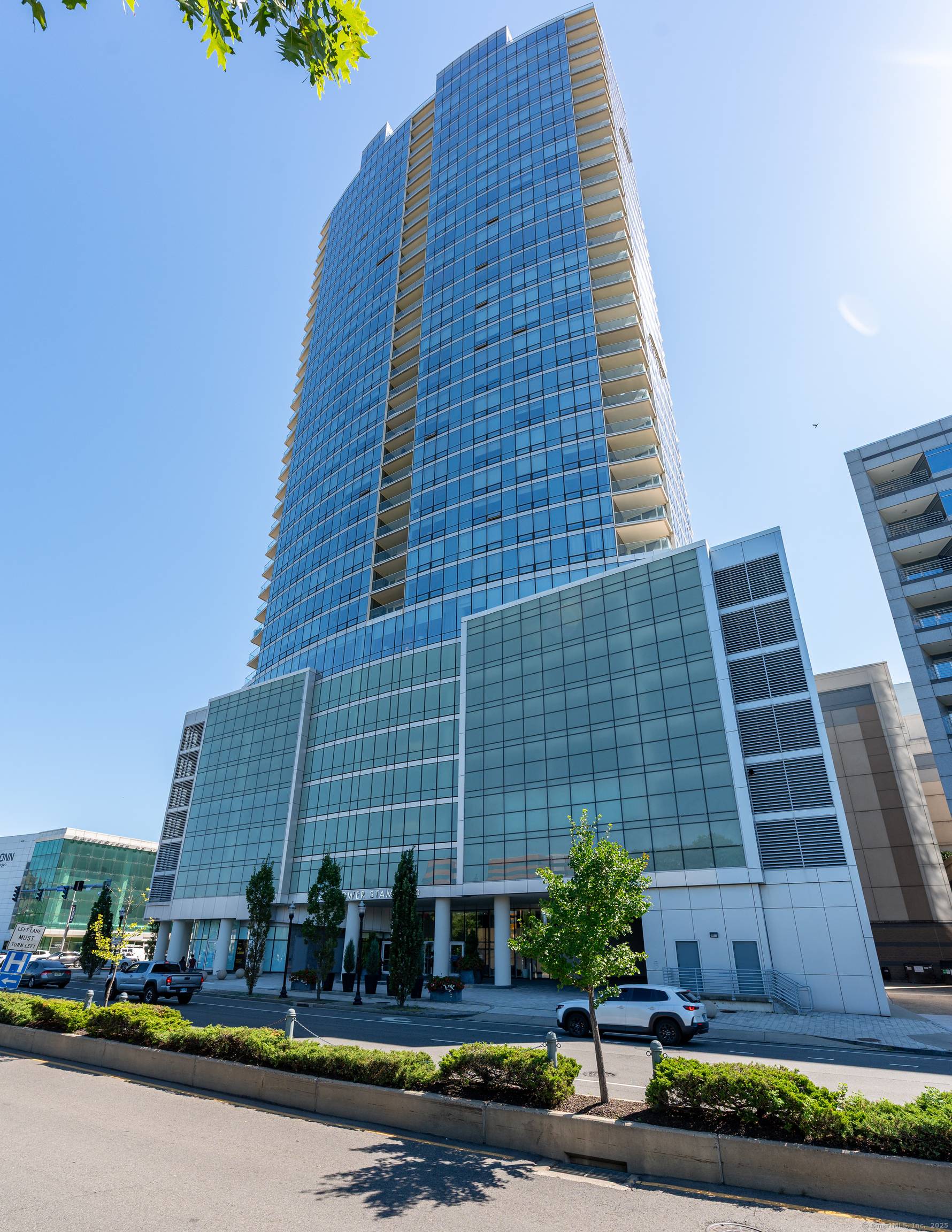 Welcome to Unit 27E at 1 Broad Street in Stamford's premier Park Tower, a luxurious 2 bedroom, 2.