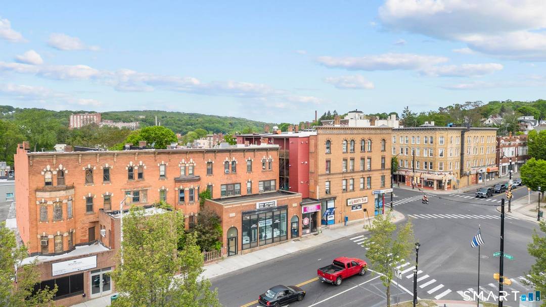 Exceptional mixed use investment opportunity Downtown featuring three contiguous parcels totaling 0.