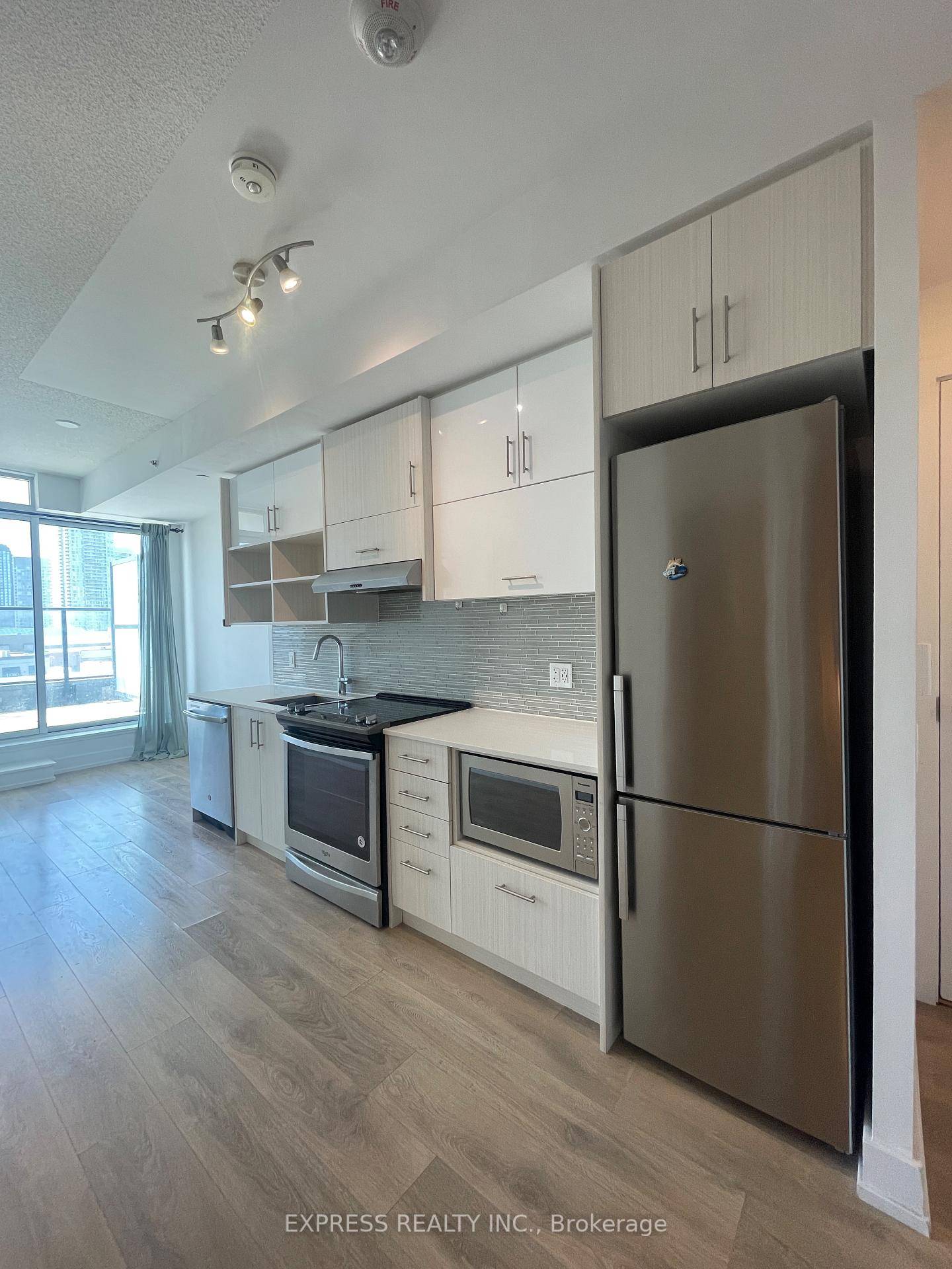 Spacious One Bedroom Den with Terrace Connect Condos Across From Fairview Mall.