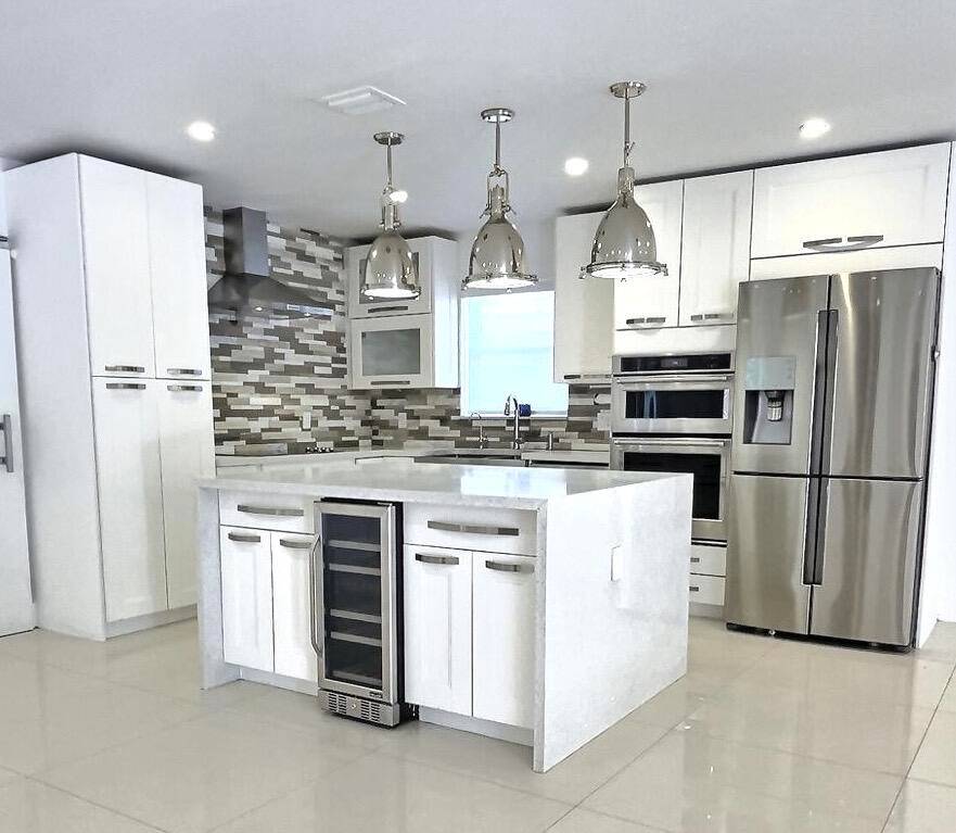Stunningly remodeled 4 bedroom 2 bath single family home in a prime neighborhood !