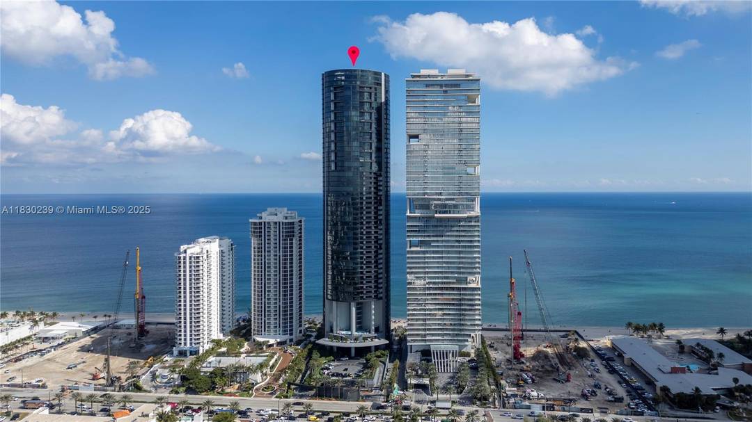 This stunning ocean view apartment in the exclusive Porsche Towers of Sunny Isles offers a blank canvas for you to create your dream living space.