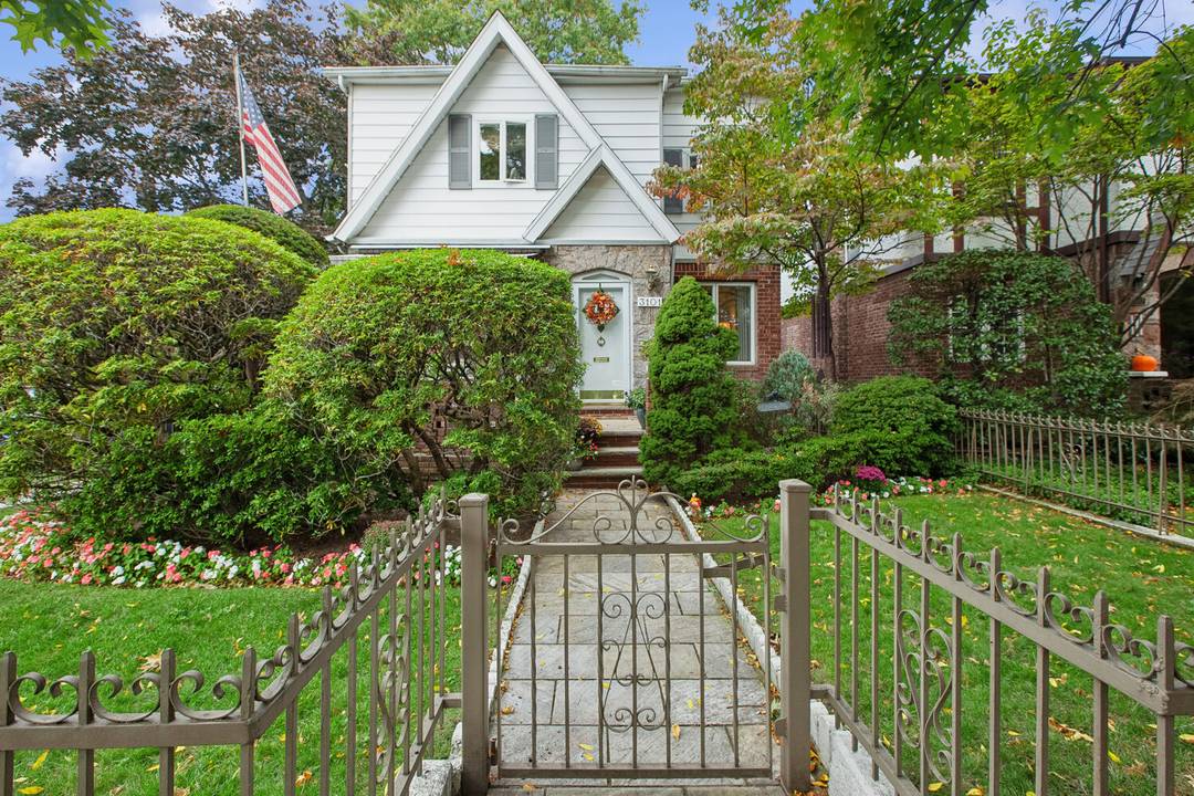 Welcome to 3101 Fillmore Avenue, a delightful Tudor style house that radiates charm and sophistication.