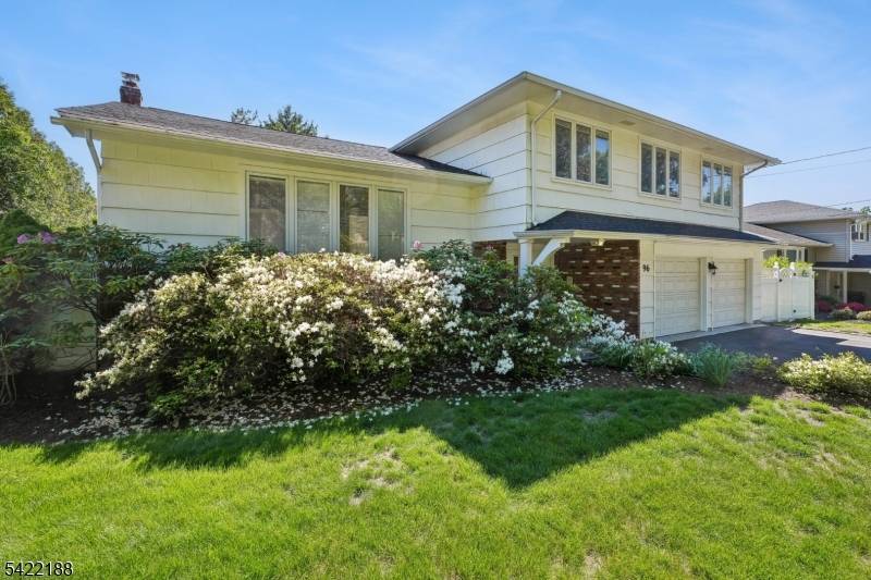 Welcome to this lovely oversized split level home located in the desirable community of Roseland.