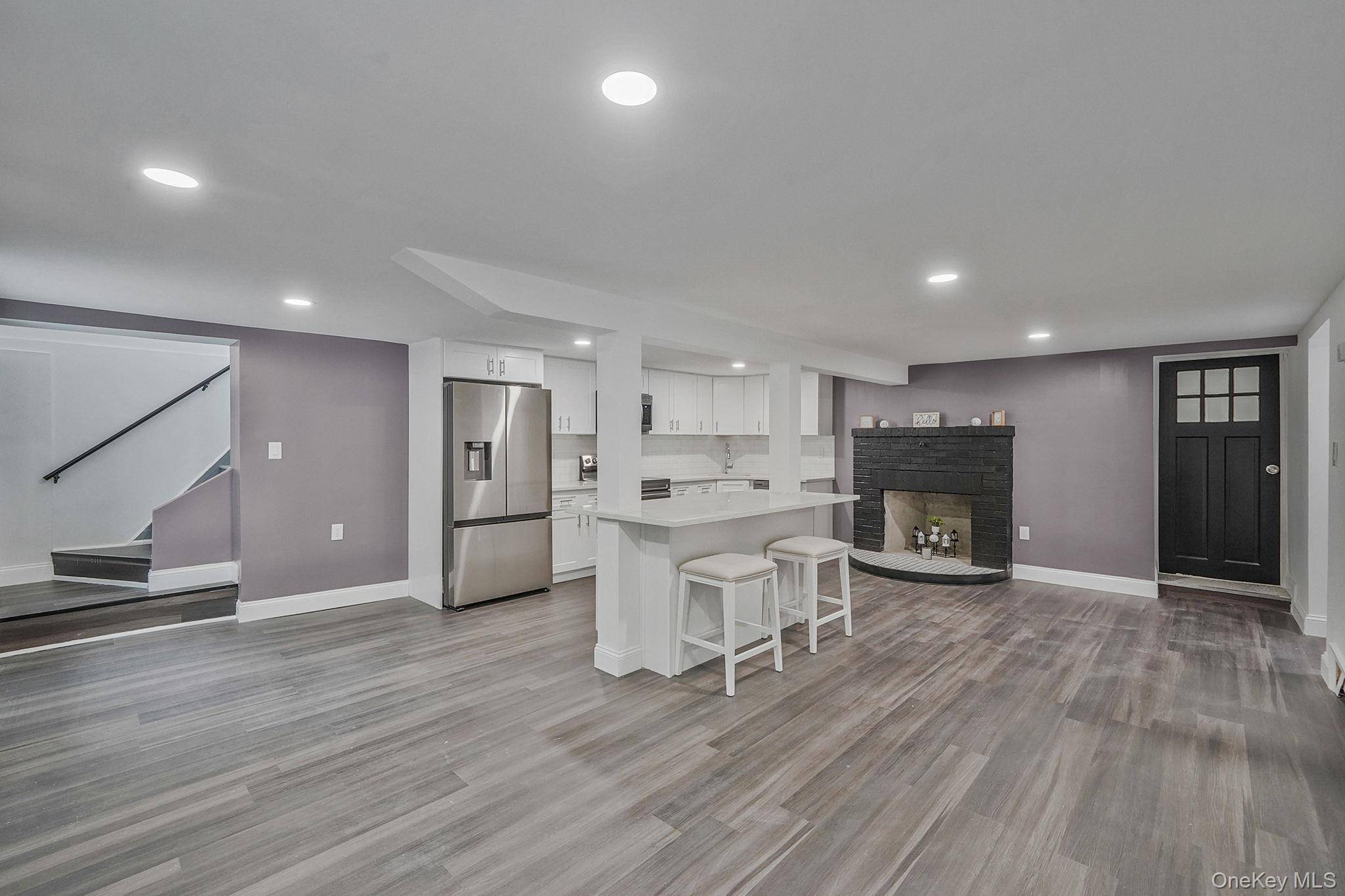 Welcome to this beautifully renovated 3 bedroom 2 bathroom Colonial home, blending timeless charm with modern updates.