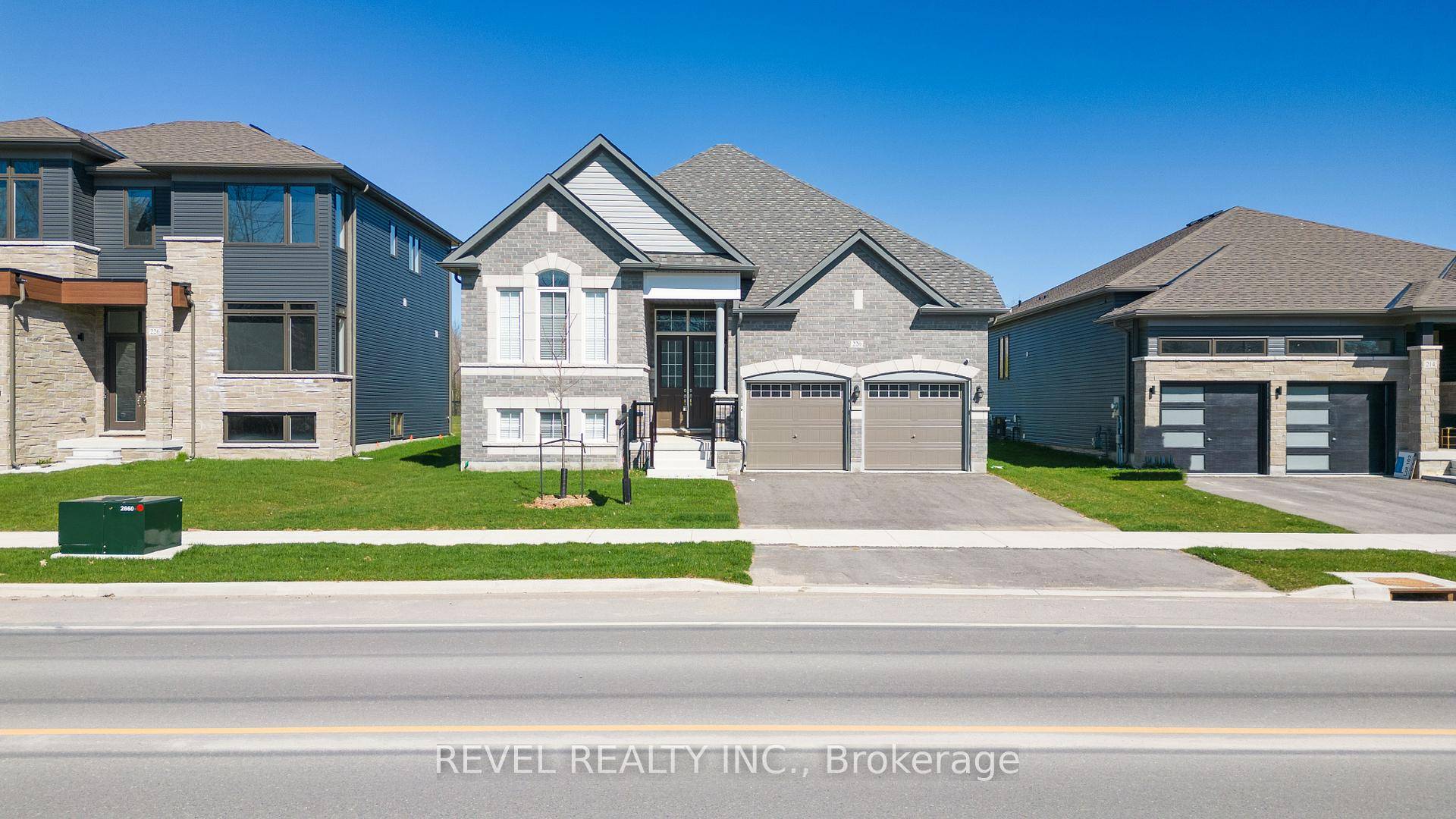 Nestled in the heart of the picturesque Wasaga Beach community Shoreline Point, 220 Ramblewood Drive is a newly built bungalow that epitomizes modern luxury living.