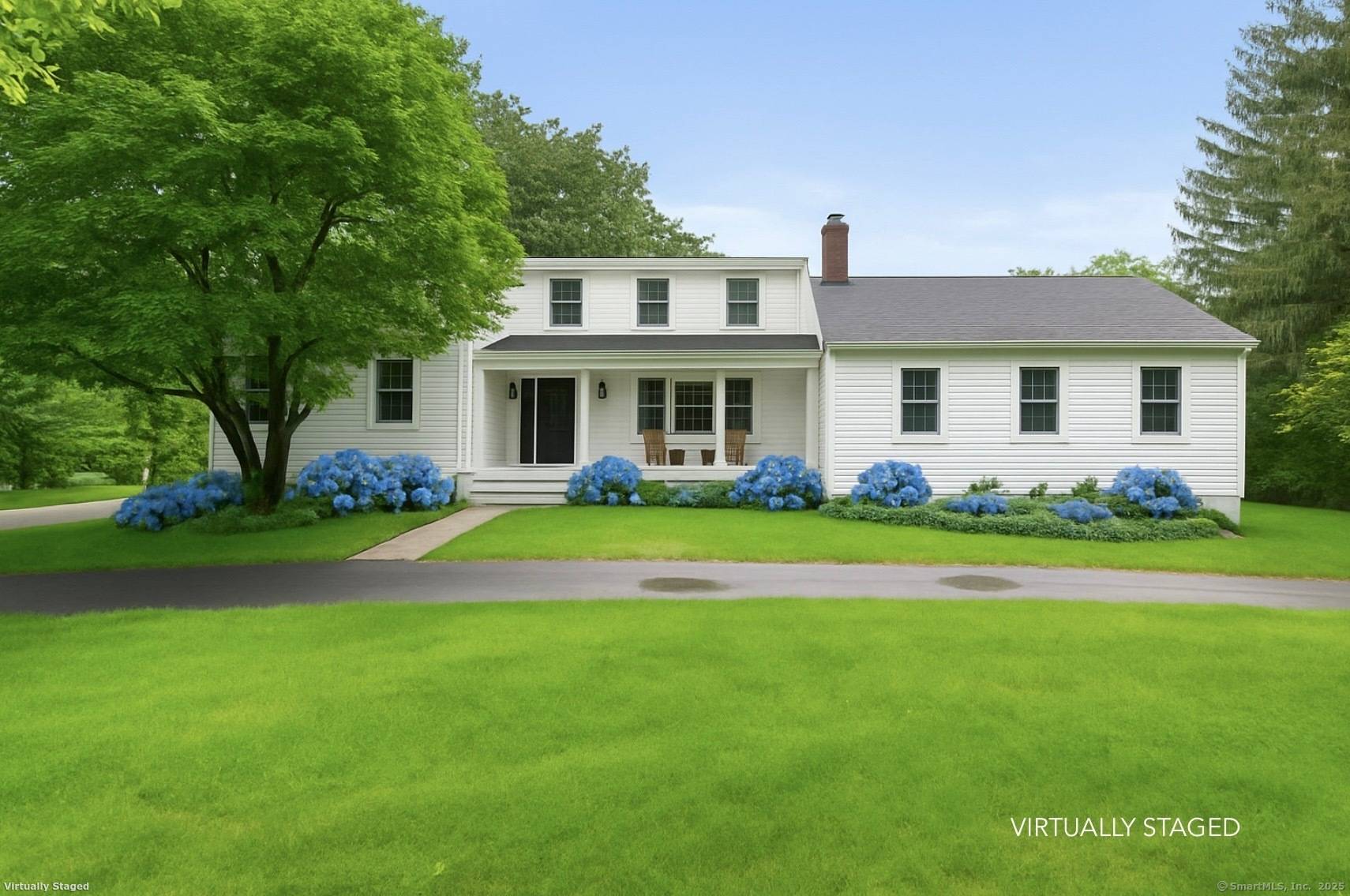 Welcome to 27 Blue Ribbon Road A serene retreat in the heart of Westport.