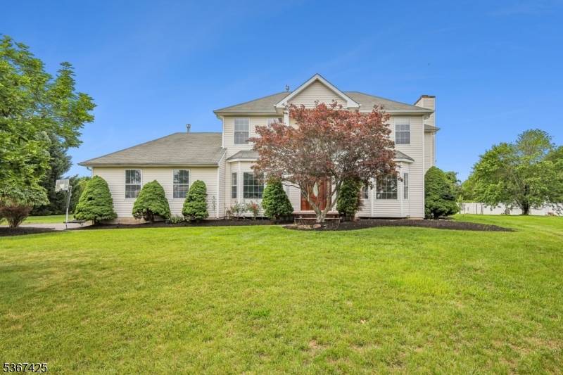 Pristine, updated colonial nestled in one of Somerset's nicest neighborhoods, Wildflower Ridge.