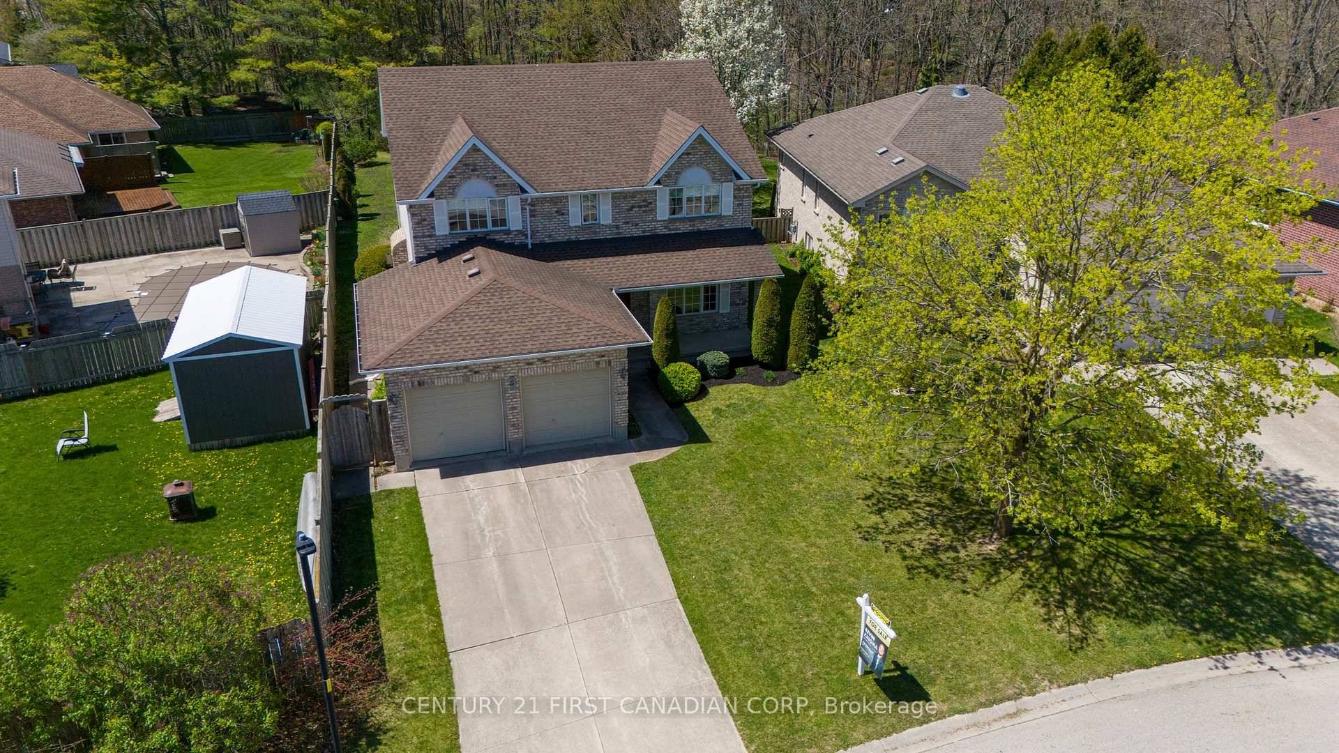 Located in one of Strathroy's most mature and picturesque neighbourhoods, this spacious 2 storey home with 4 1 bedrooms and 3.
