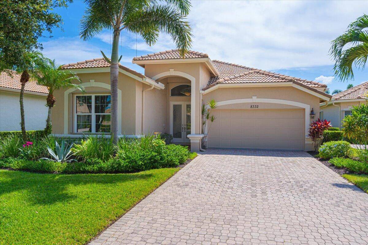 GORGEOUS POOL HOME IN THE SOUGHT AFTER PGA VILLAGE.