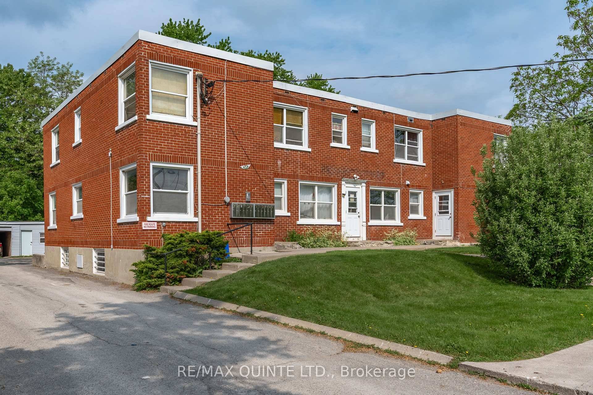 Welcome to 54 Sidney Street a cash flowing, turnkey 12 unit all brick multiplex located in Belleville's desirable west end.