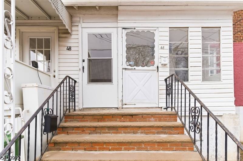 Welcome to this beautifully maintained 2 bedroom, 1 bath half duplex home in Linden, NJ, offering the perfect blend of comfort, style, and functionality.
